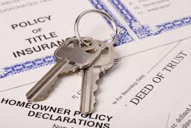 house keys and title insurance forms