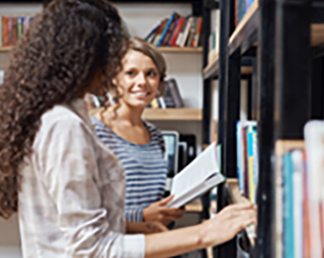 Librarian helping with Interlibrary Loan Services