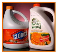 picture of a clorox bottle and an orange juice jug of similar size and shape